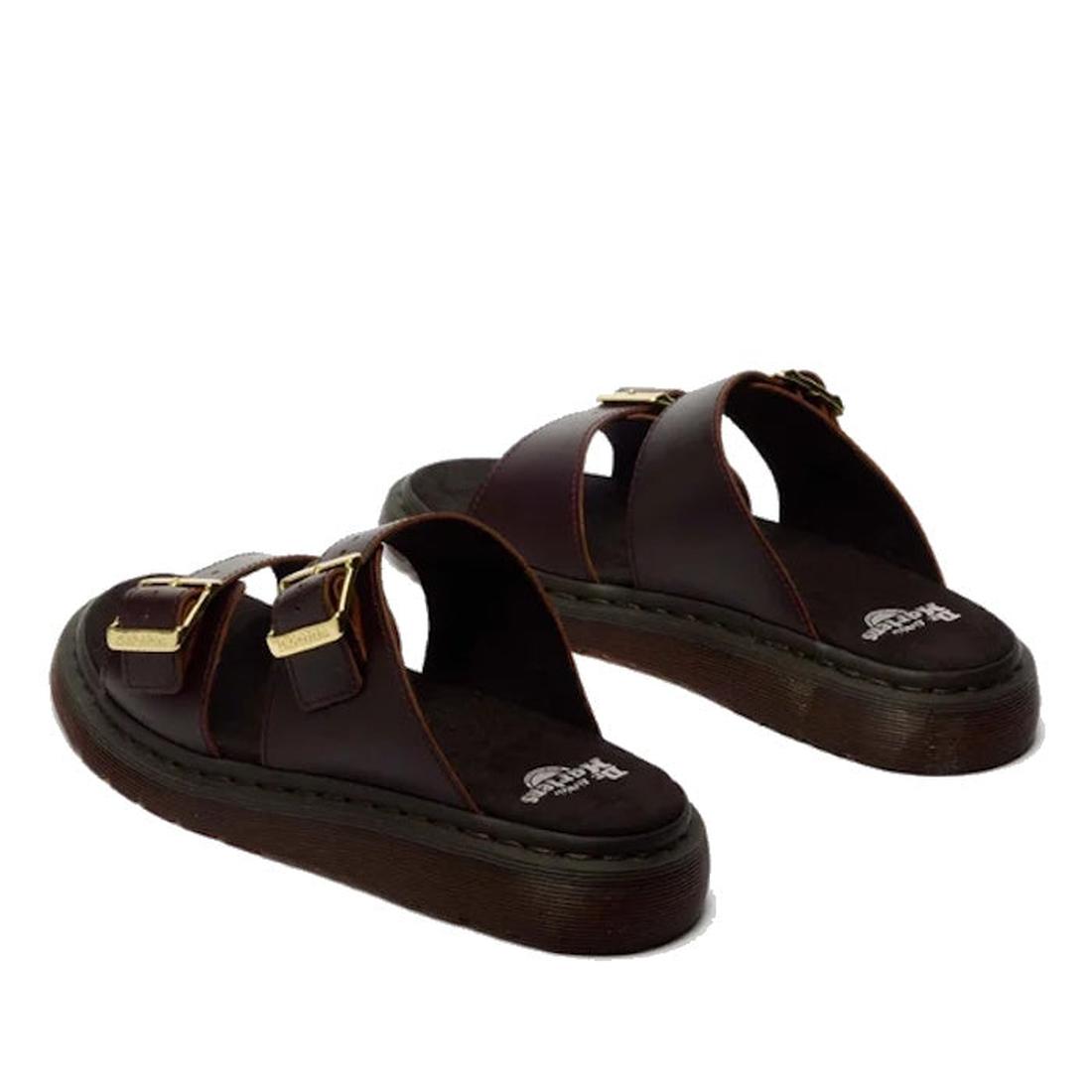 The Dr Martens Josef Charro Atlas Slide Sandal features dark brown Atlas leather, two wide straps with gold buckles, an open toe design, and a thick textured sole, shown against a white background., 52357, 190665783841, 190665783858, 190665783872, 1906657