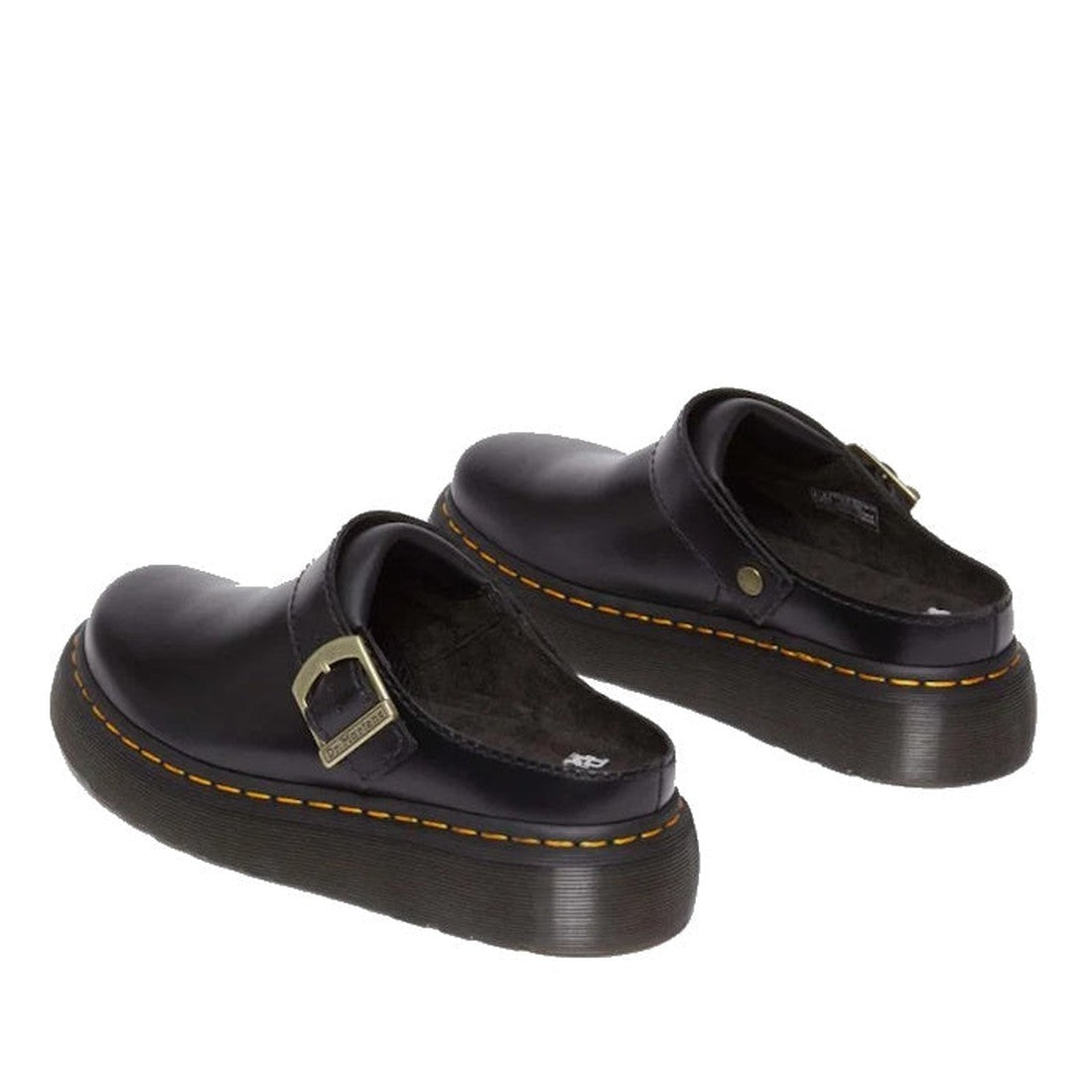 A pair of Dr. Martens Laketen Black Atlas Archive Mule Slide Sandals with thick soles, yellow stitching, silver buckles, and a chunky platform heel, shown from the side to highlight their slip-on design., 190665644302, 190665644319, 190665644333, 190665644340, 190665644357