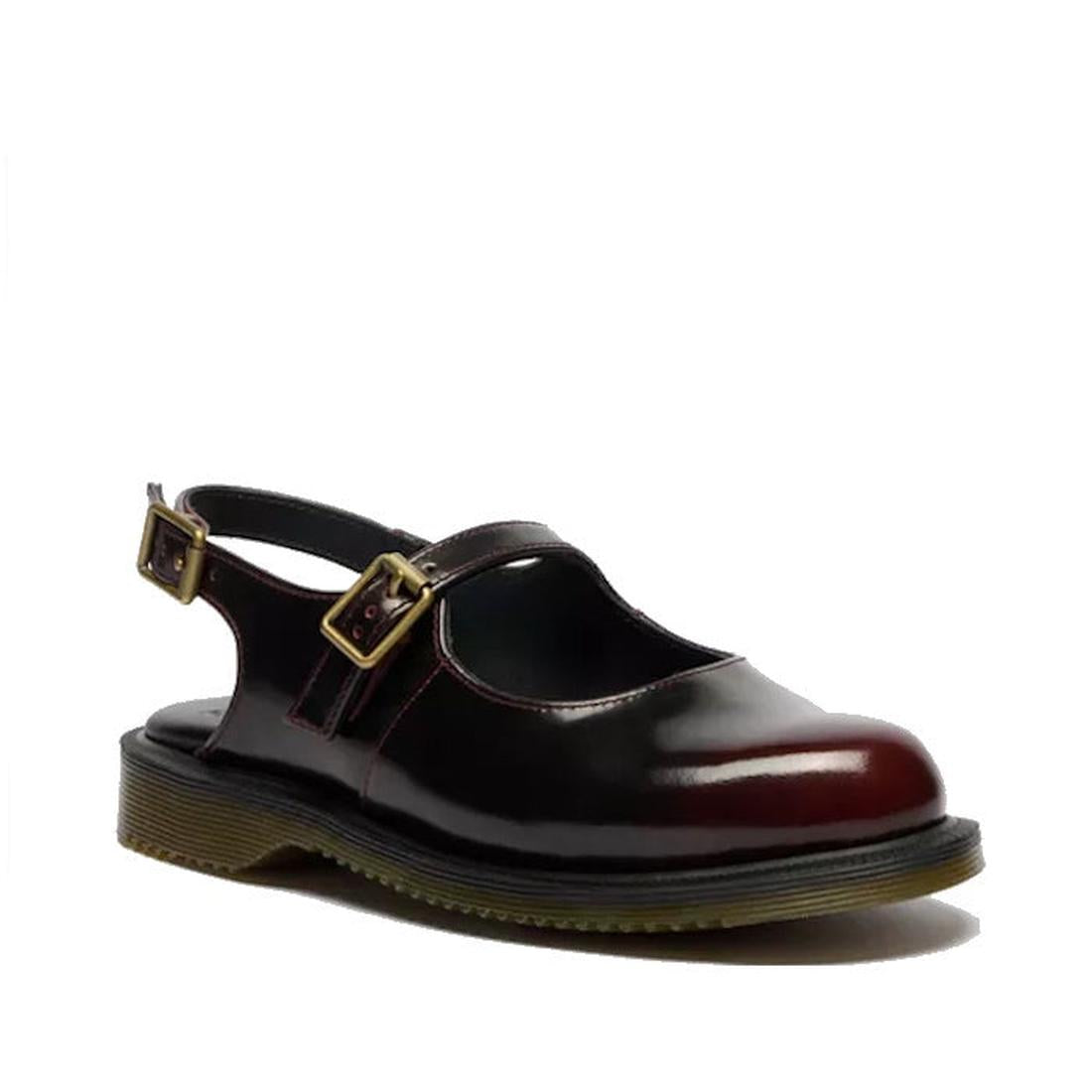 A single Dr. Martens Madaline Cherry Red Arcadia Women's Slingback Mary Jane shoe, featuring polished leather, a closed toe, two adjustable gold buckles, and a thick Goodyear welted sole for comfort and durability.