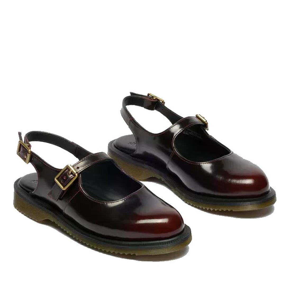 A pair of Dr Martens Madaline Cherry Red Arcadia Women’s Slingback Mary Jane shoes with open heels, gold buckles, chunky black soles with yellow stitching, made from Polished Smooth leather and Goodyear welted.