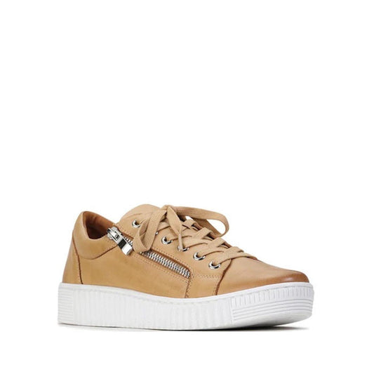 The EOS Joyce Tan Leather Trainer features an Italian Aniline leather upper, white rubber sole, tan laces, metal eyelets, silver side zipper, and anatomical insole for comfort—all shown against a plain white background.