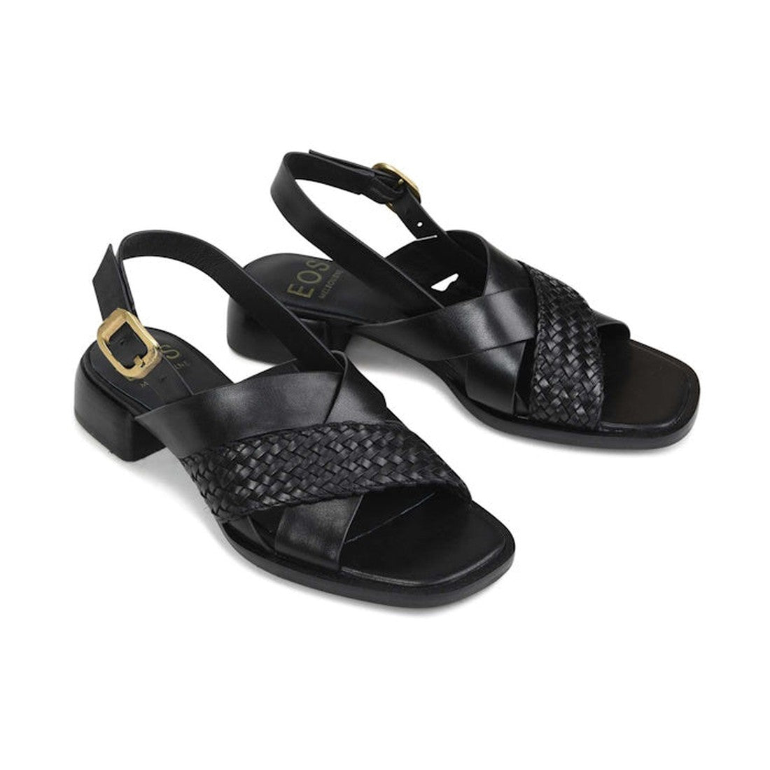EOS Laticia Black Leather Sandal—worn with comfort in mind, has soft woven straps, a mini heel, gold buckle, and easy back strap.  ksnz, 9321191222943, 9321191222950, 9321191222967, 9321191222974, 9321191222981