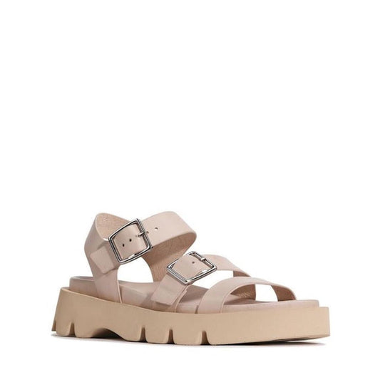 The EOS Monn Birch Womens Leather Buckle Sandal features an anatomical footbed, thick ridged sole, two wide silver-buckled straps, and an open toe design in beige leather, shown against a plain white background.