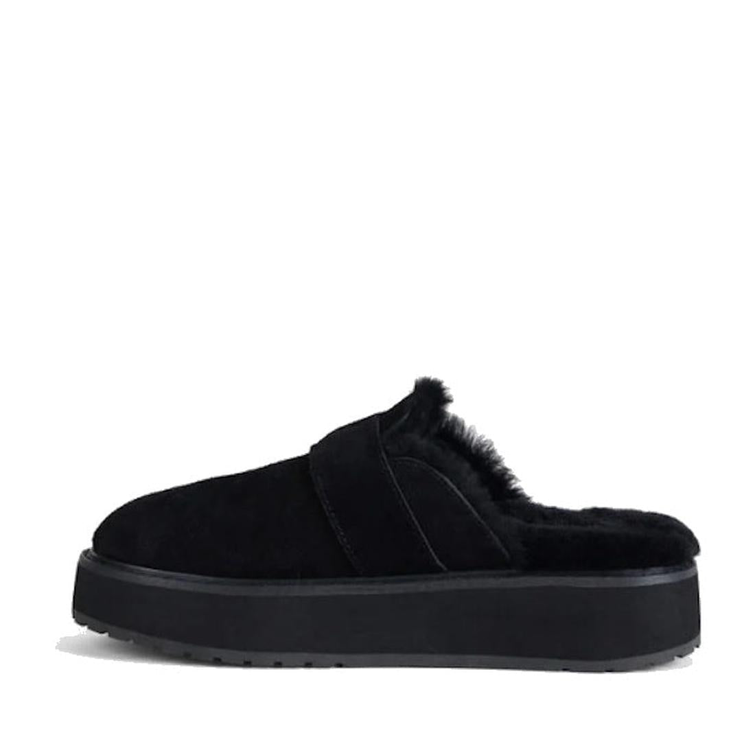 The Emu Womens Adison Black Sheepskin Wool Mule Slipper Scuff features a thick platform sole and plush sheepskin lining, shown in side profile against a white background., 50710, 9330071990797, 9330071990803, 9330071990810, 50714, 50715