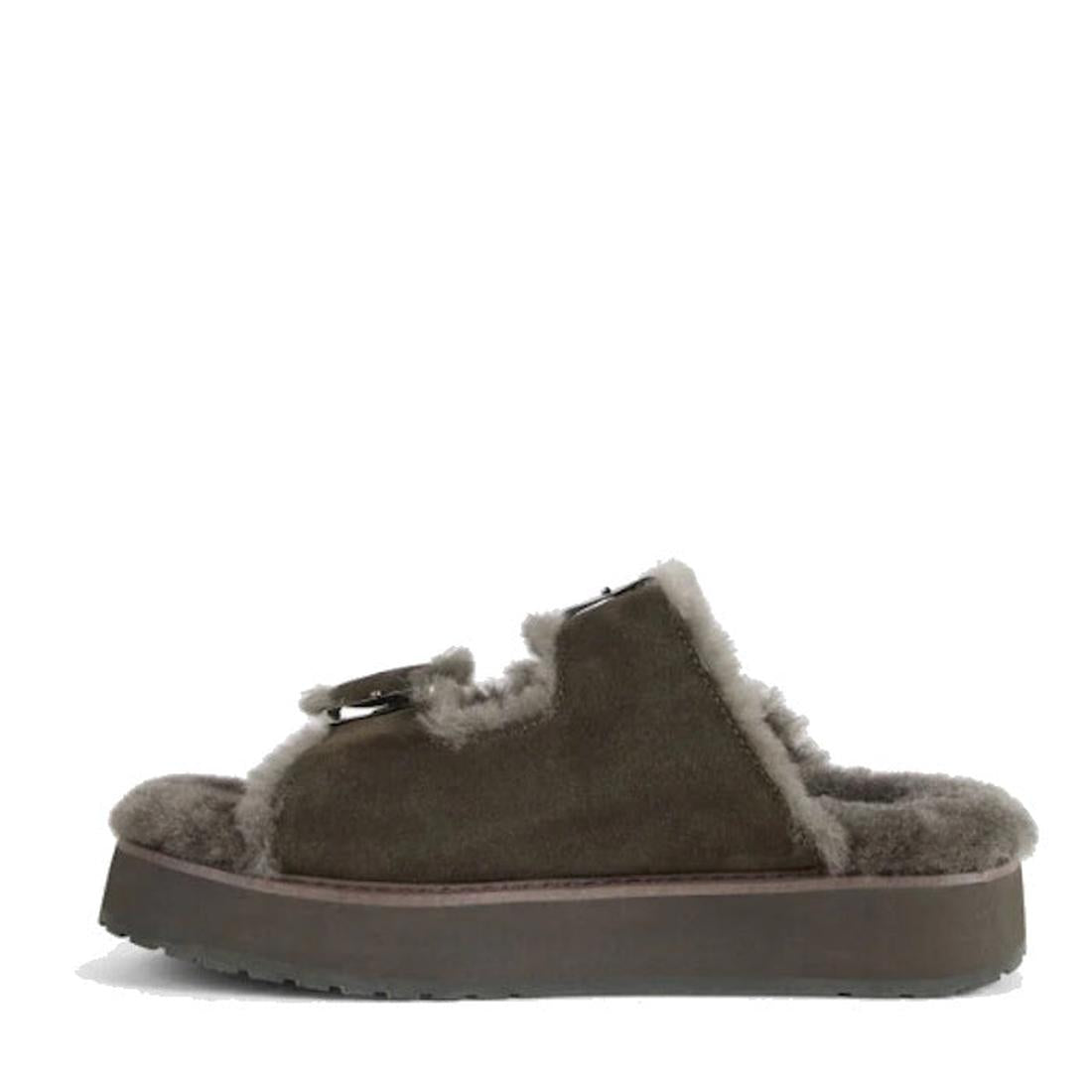 The Emu Womens Cabello Dark Olive Sheepskin Wool Slipper Slide is shown in side profile on a white background, featuring an open toe, open heel, faux fur lining, and a buckle strap across the top for cozy comfort., 50698, 9330071990681, 9330071990698, 933