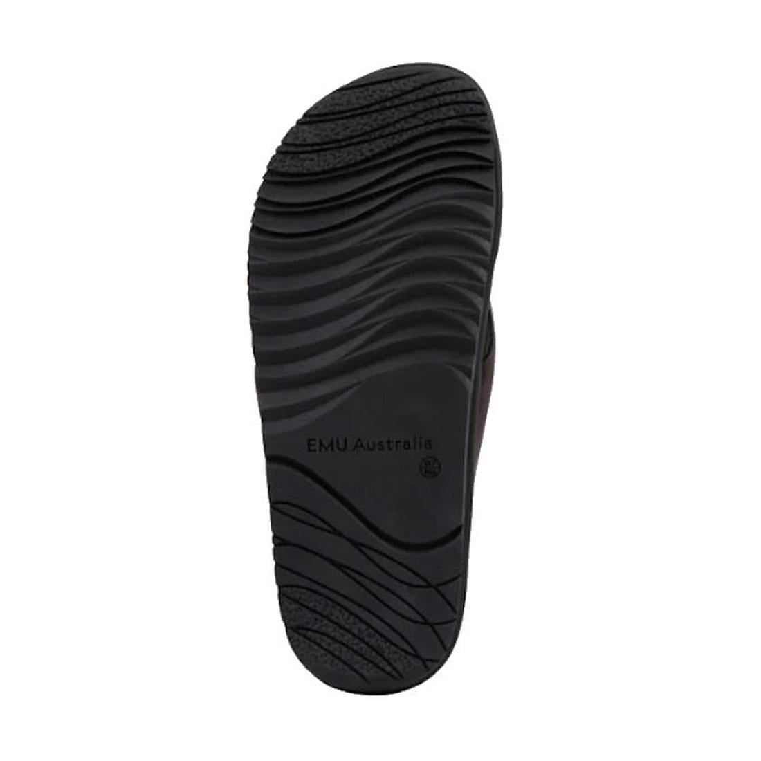 The image shows the black rubber sole of the Emu Ebony Espresso Black Leather Slide Sandal with curved, wavy tread patterns for grip and "EMU Australia" embossed in the center., 9330071983454, 9330071983461, 9330071983478, 9330071983485, 9330071983492, 93