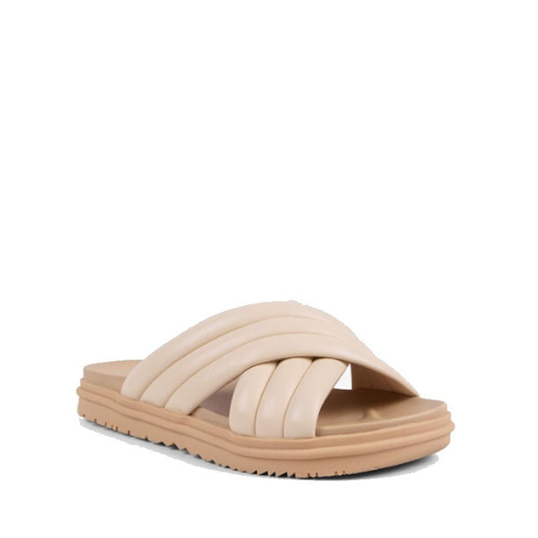 The Emu Ella Macadamia Tan Off White Leather Women's Summer Slide features soft padded crisscross leather straps and a thick, textured sole, shown against a white background.