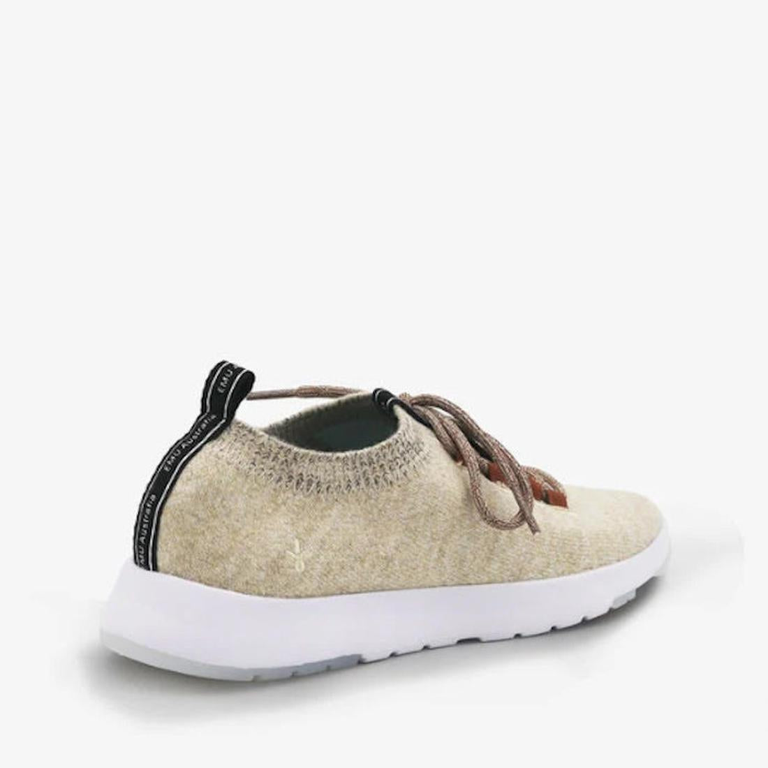 The Emu Heidelberg Wool Sneaker in Oatmeal features beige natural wool, brown laces, a white sole, and a black heel pull tab—shown angled to display the back and side—ideal for comfortable travel., 42773, 9330071956465, 9330071956472, 9330071956489, 93300