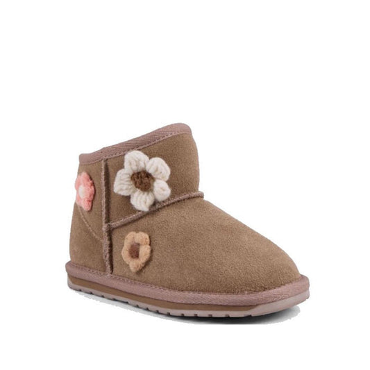 The EMU Kids Daisy Mushroom Merino Wool Boot is a brown suede mini boot for children, lined with cozy Merino wool and decorated with cream, brown, and pink daisy appliqués on a matching sole.