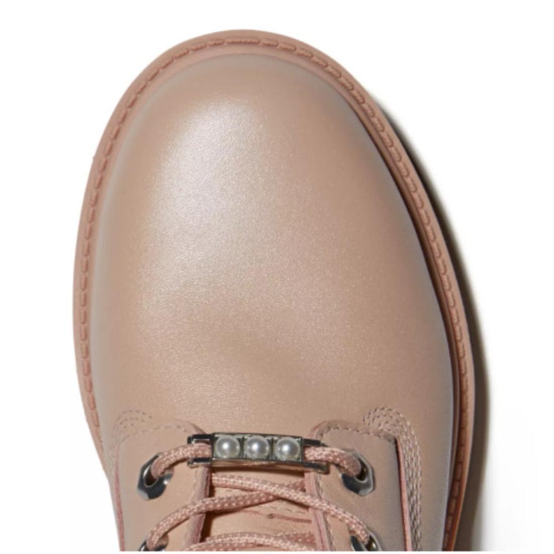 Timberland Heritage 6 Inch Waterproof Boot in Light Pink, with cozy PrimaLoft, sturdy sole, easy lace-up, and kid-friendly fit.  ksnz