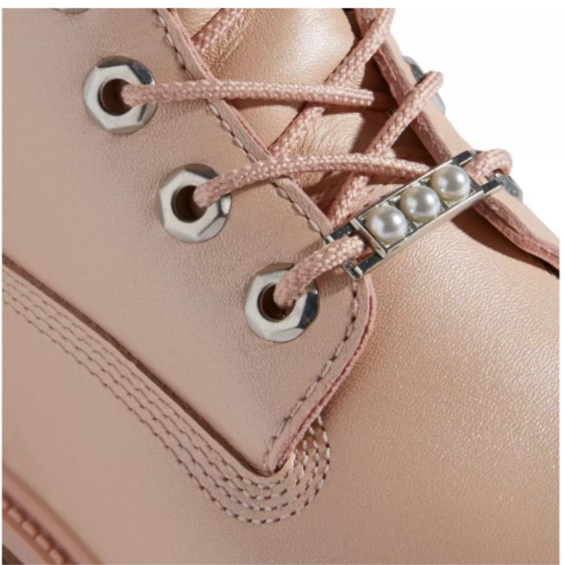 Timberland Heritage 6 Inch Waterproof Boot for kids in soft light pink nubuck, with pink laces, sturdy sole, and pretty pearl accents.  ksnz