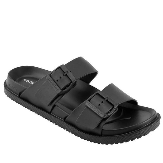 The Holster Soleseeker Black Women’s Summer Slide is shown at an angle on a white background, featuring two adjustable buckle straps, a textured sole, and enhanced arch support for added comfort and stability.