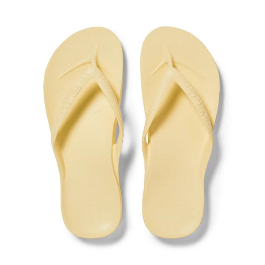 The Archies Footwear Arch Support Jandal in cheerful Lemon Yellow features comfy straps, a textured sole, and gentle arch support.  ksnz