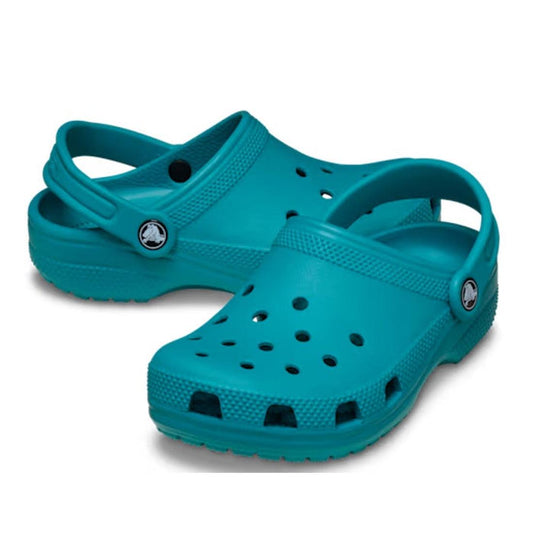 The Crocs Kids Toddlers Classic Clog in Turbo Teal Green features ventilation holes, adjustable back straps, and textured soles, shown on a white background. Available in toddler sizes.