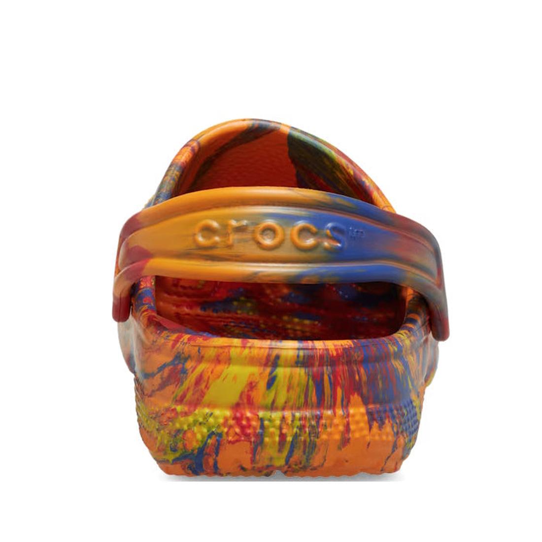 A rear view of the Crocs Kids Toddlers Classic Clog K Marbled Orange Zing Multi shows a swirling orange, blue, yellow, and green marbled pattern with "Crocs" embossed on its adjustable heel strap., 198445269745, 198445269752, 198445269769, 198445269776, 1, 198445269714