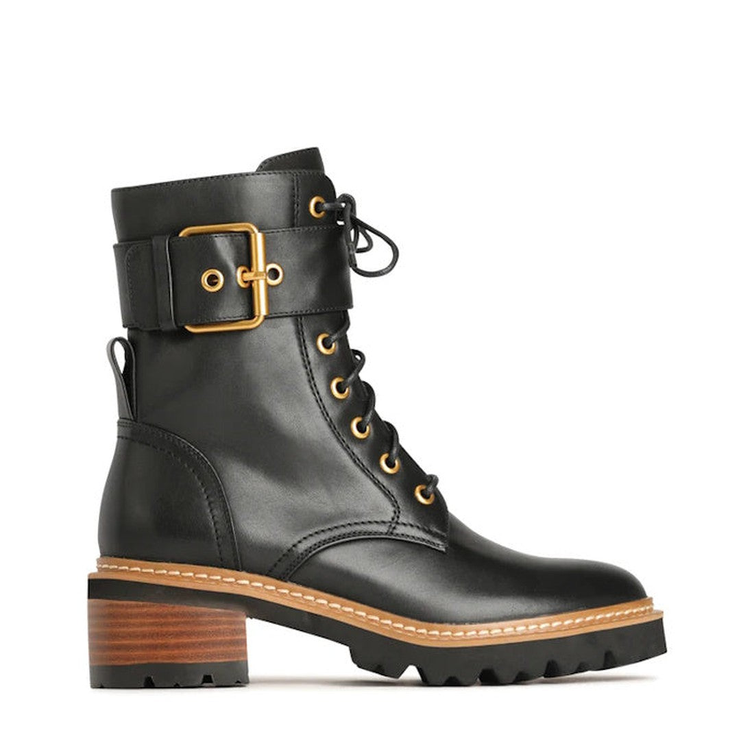 The EOS Line Black Women's Leather Boot features gold eyelets, a decorative ankle strap, buckle detail, chunky stacked heel with wood-like finish, thick tread sole, and a lace-up front for a stylish combat look.