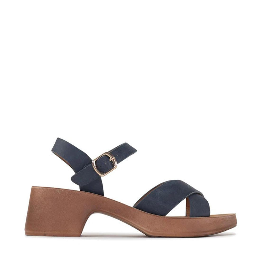 A side view of the Los Cabos Alegra Navy Wedge Platform Backstrap Sandal shows navy crisscross toe straps, a brown low block heel, ankle strap with gold buckle, vegan materials, and a cloud-soft outsole on a white background., 9321191292311, 9321191292328
