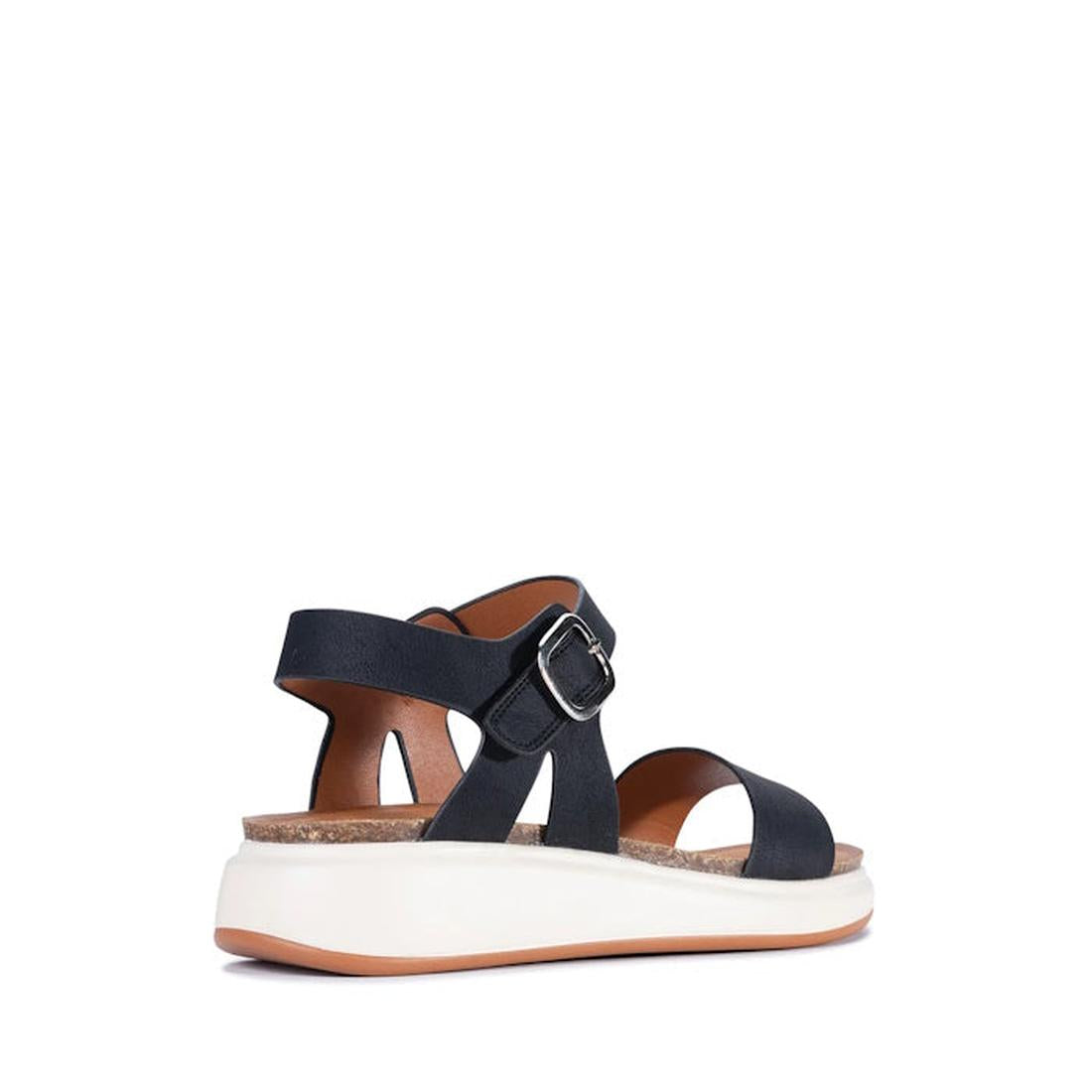 The Los Cabos Cartis Black Women's Summer Sandal Slight Platform, with strappy vegan leather, buckle, moulded footbed, and thick white sole, is shown angled from the back on a plain white background., 9321191298894, 9321191298900, 9321191298917, 932119129