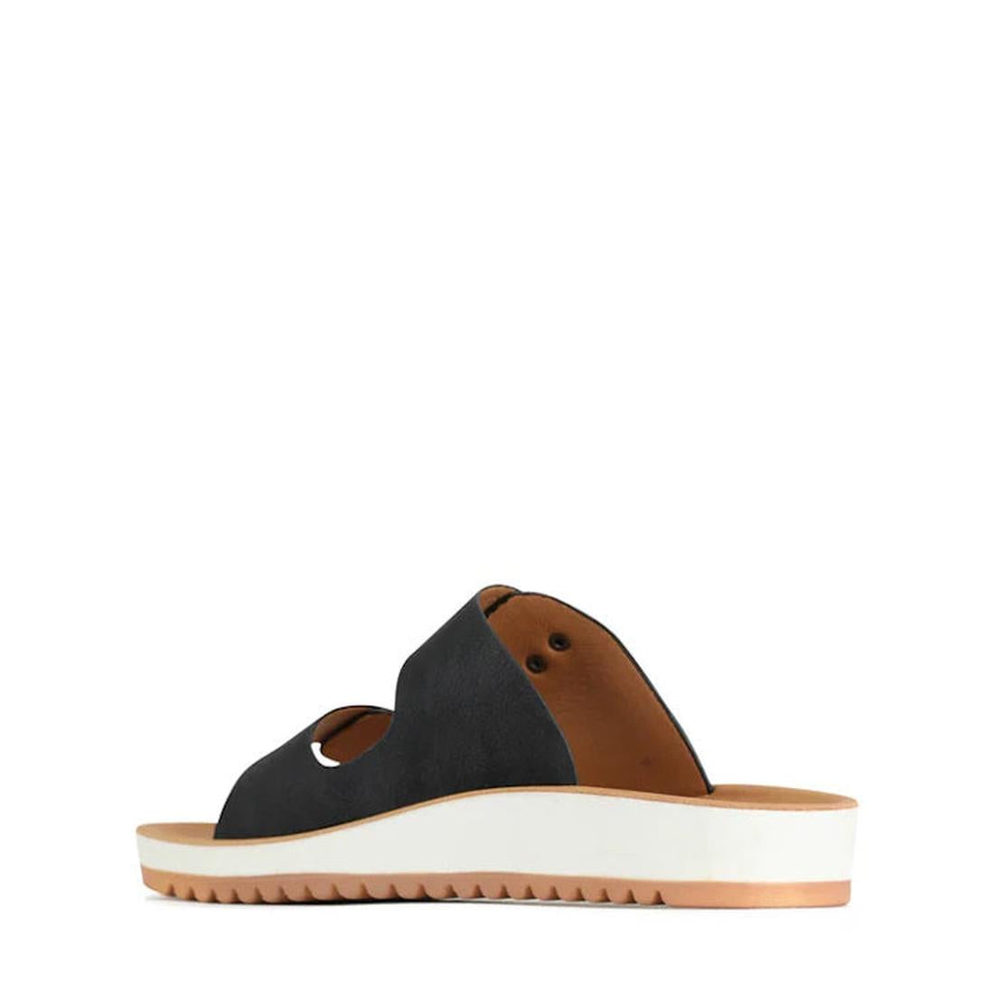 The Los Cabos Naara Black Adjustable Summer Womens Slide Sandal is a black vegan leather slip-on with open toe, cut-out details, arch support, a brown insole, and a thick white ridged sole, shown in side profile on a white background., 46997, 932119115873
