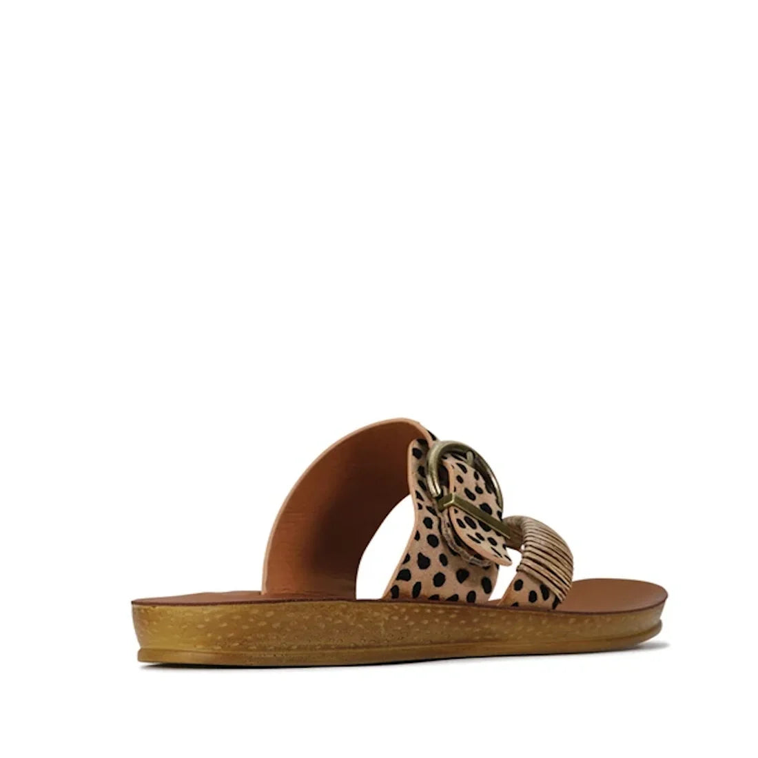 Introducing the Los Carbos Bria Cheetah Beige Black Light Flexible Sandal Jandal—a single slip-on sandal with a brown sole and two wide straps in a tan and black spotted pattern, accented by a large circular buckle. Inspired by the Bria collection, this s