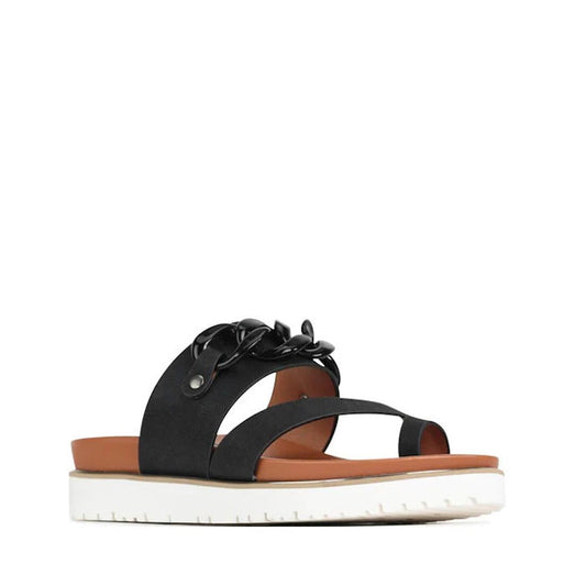 The Los Cabos Cai Sandal for kids in black has a comfy tan footbed, easy slip-on style, sturdy platform sole, and bold chain strap.  ksnz