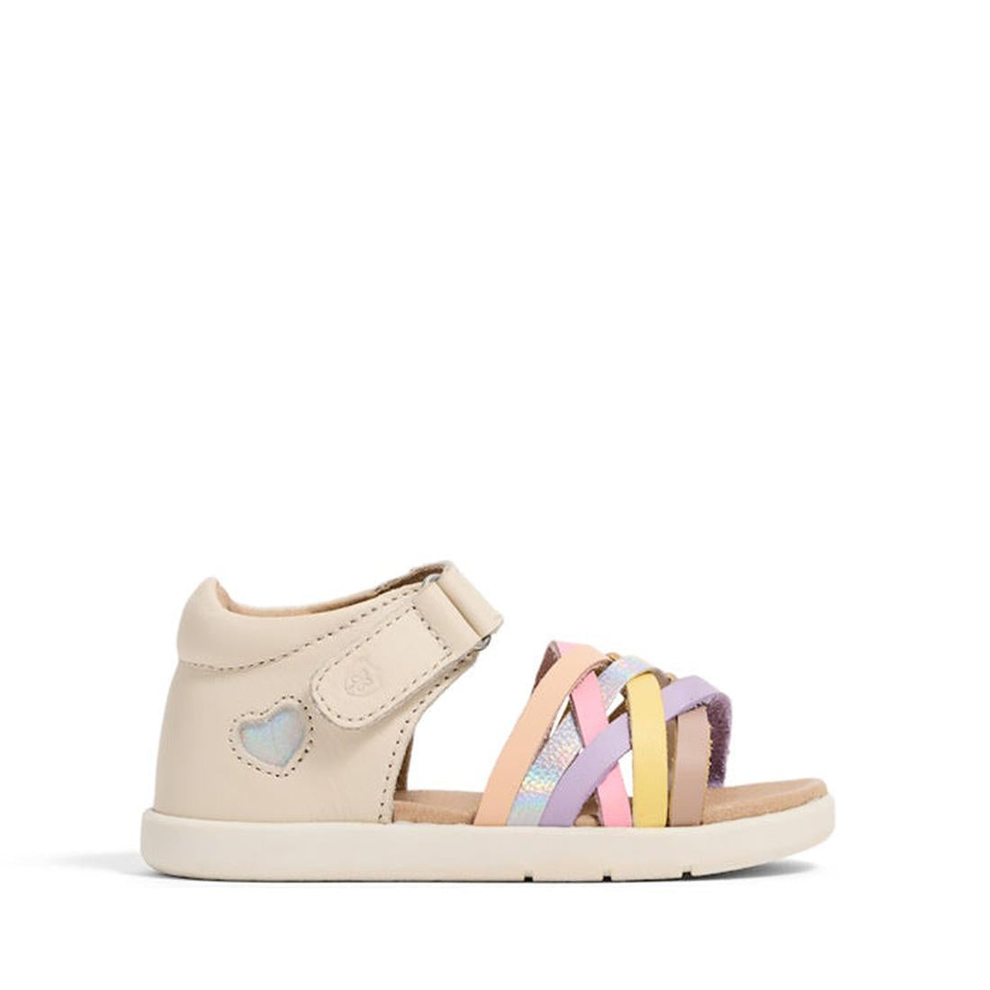 The Pretty Brave 1st Walker Eden Rainbow Leather Open Toe Sandal is a beige girls' sandal with a closed heel, adjustable strap, heart detail, and pastel yellow, pink, and lavender crisscross straps—podiatrist-approved on white background., 9420075355705, 