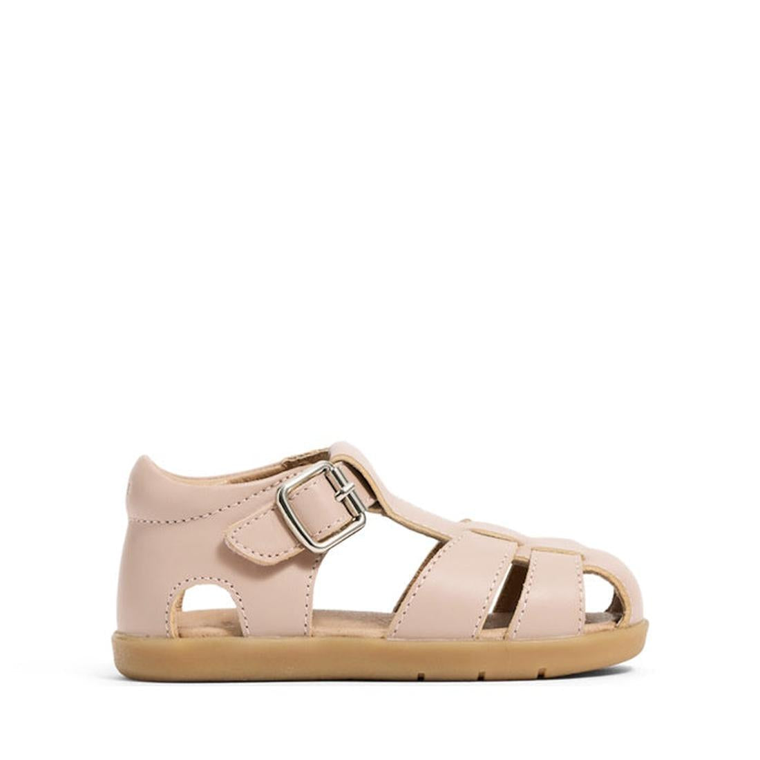 The Pretty Brave 1st Walker Maddie Blush Close Toe Leather Sandal is a light pink kids' sandal with a tan rubber sole, adjustable silver buckle, multiple cutouts, and supportive heel—podiatrist approved for summer wear., 9420075355903, 9420075355897, 9420