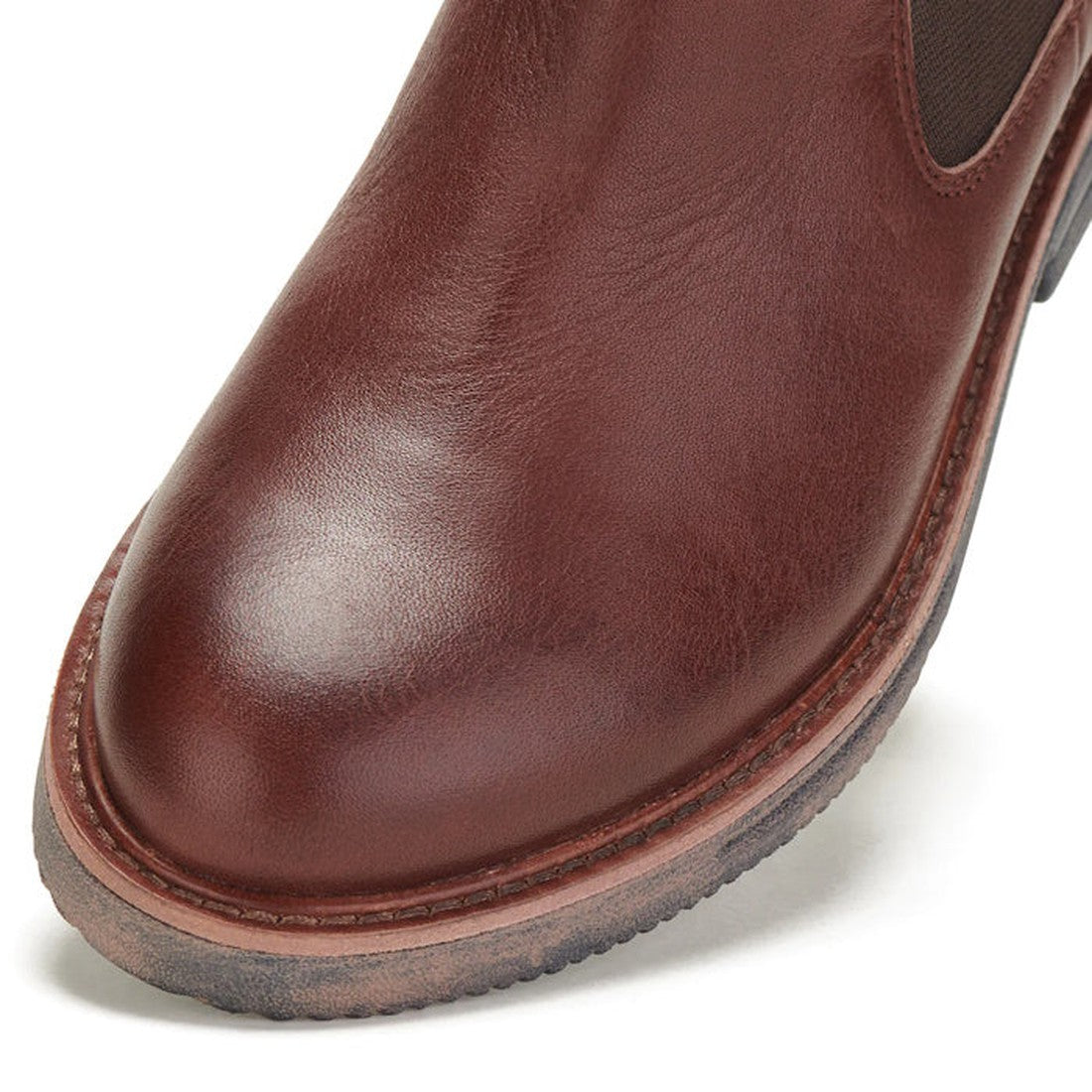 Close-up of the toe area of the Rollie Womens Chelsea Rise Vintage Mocha Leather Boot, highlighting its premium leather, smooth polished texture, and detailed stitching along the sole edge., 9339554341682, 9339554341699, 9339554341705, 9339554341712, 9339