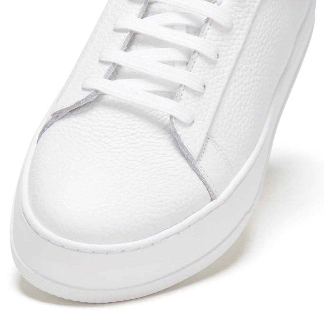 Close-up of the Rollies Womens Court Club All White Leather Trainer, featuring white leather, white laces, an anti-slip rubber outsole, textured details, and a minimalist design., 9781760768737, 9781760768744, 9781760768751, 9781760768768, 9781760768775