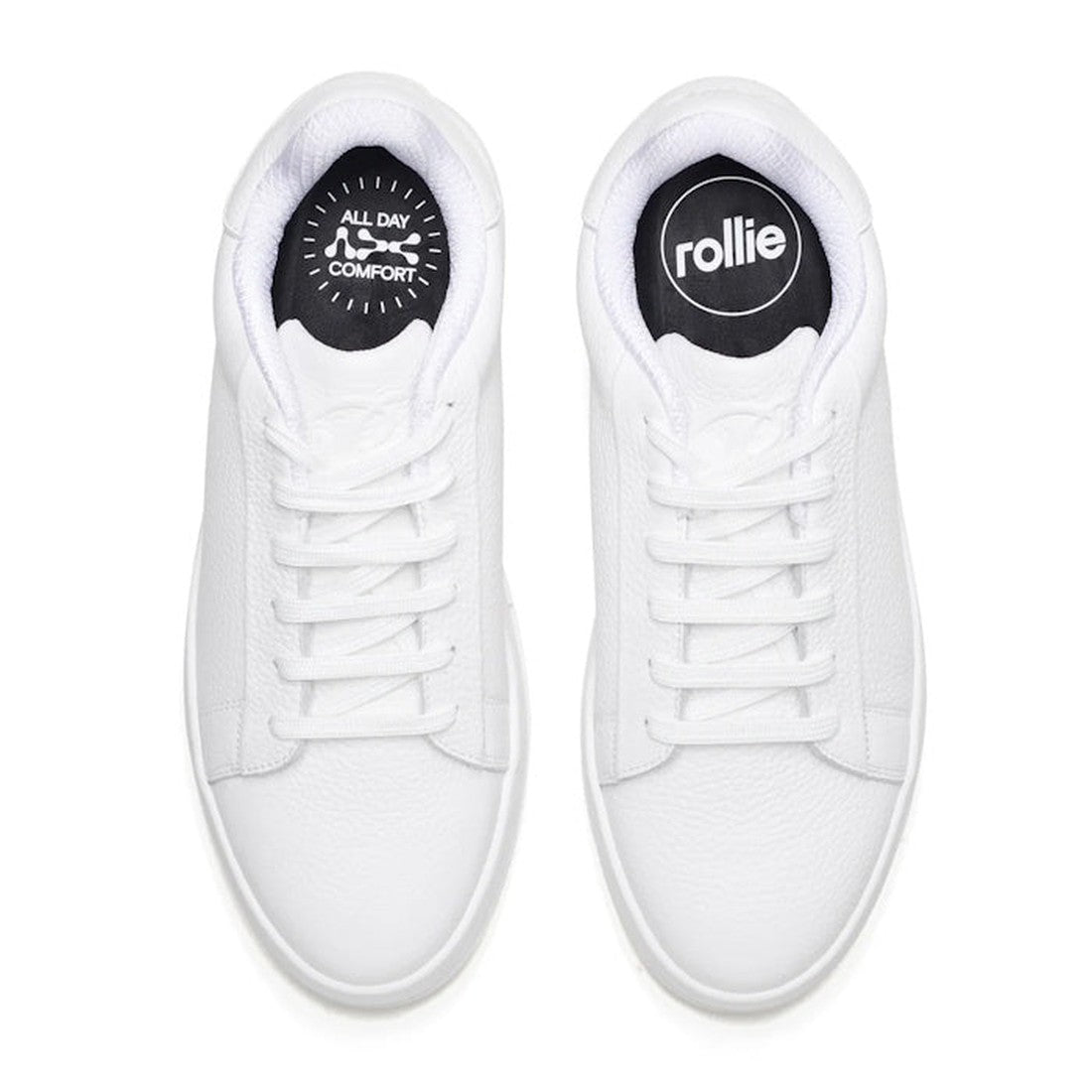 Top view of Rollies Womens Court Club All White Leather Trainer in white leather with textured finish. Left insole reads ALL DAY COMFORT, right has the rollie logo—both in white on black. Features an anti-slip rubber outsole., 9781760768737, 9781760768744