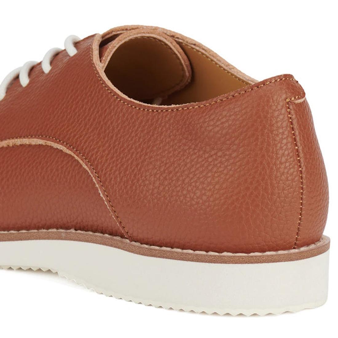 Heel shot of Rollie Derby Cognac Brown recycled leather shoe with pebbled textured look in the leather, white laces on a white background.,
9781760789831,
9781760789848,
9781760789855,
9781760789862,
9781760789879,
9781760789886,, 9781760789831, 978176078