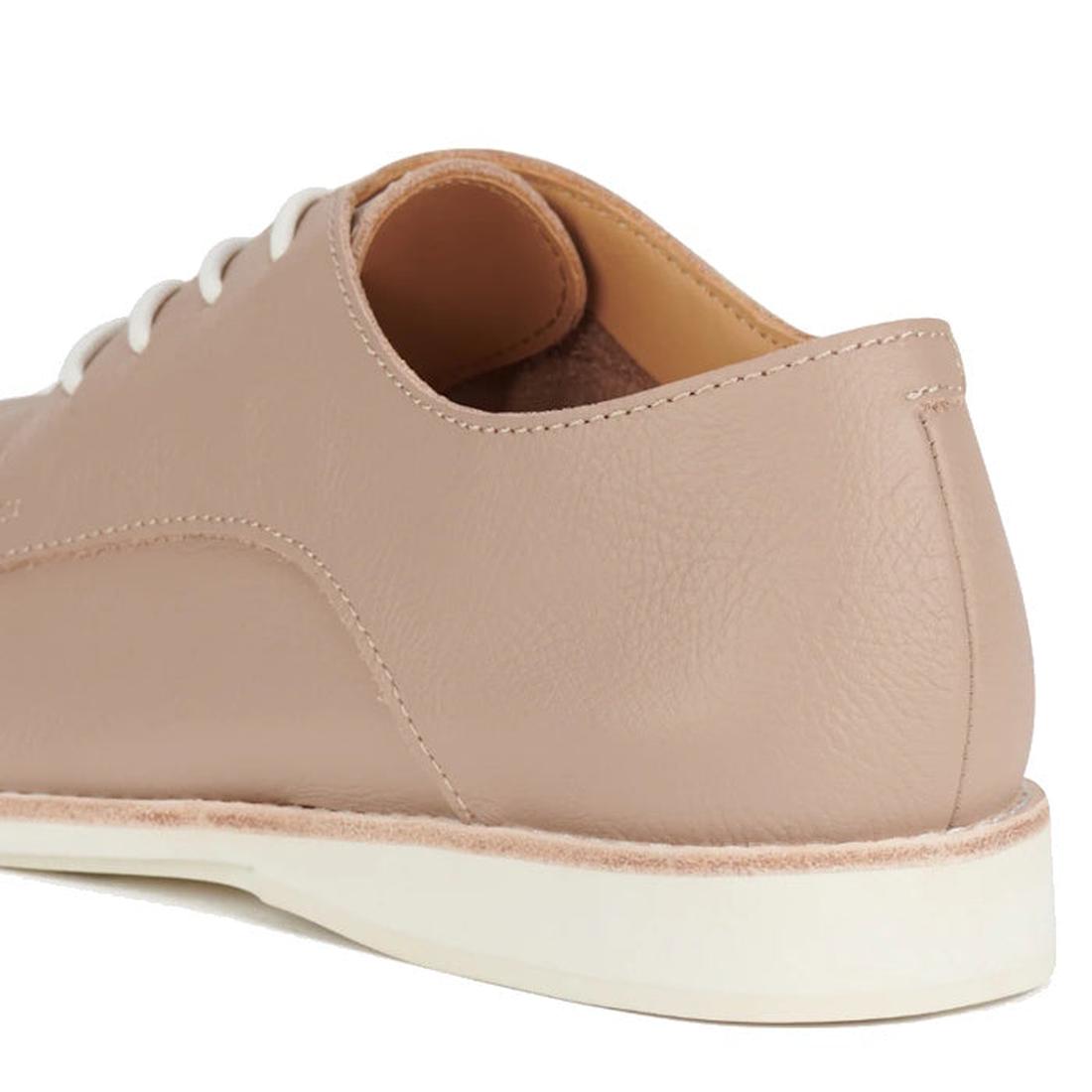 Close-up of the back and side of the Rollie Womens Derby Super Soft Clay Leather Shoe in beige leather with white laces and a white sole, designed in Australia, photographed on a white background., 9781760781552, 9781760781576, 9781760781507, 52452, 52453