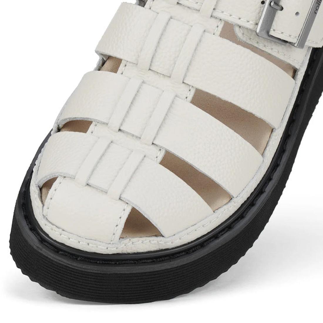 Toe detail of the Rollie Hyde Fisherman sandal in Bone with stitching detaol of the upper to the sole. with black sole on a white background.,
9781760788933,
9781760788940,
9781760788957,
9781760788964,
9781760788971,, 9781760788933, 9781760788940, 978176