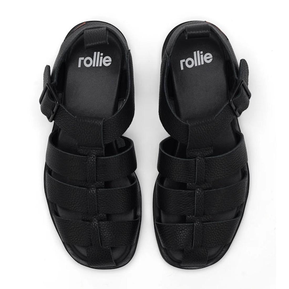 Top down view of a pair of Rollie Black fisherman sandals black  with 'rollie' branding on the footbed and ankle buckle on a white background. Letaher has a textured pebbled look.,
9781760777722,
9781760777739,
9781760777746,
9781760777753,
9781760777760,