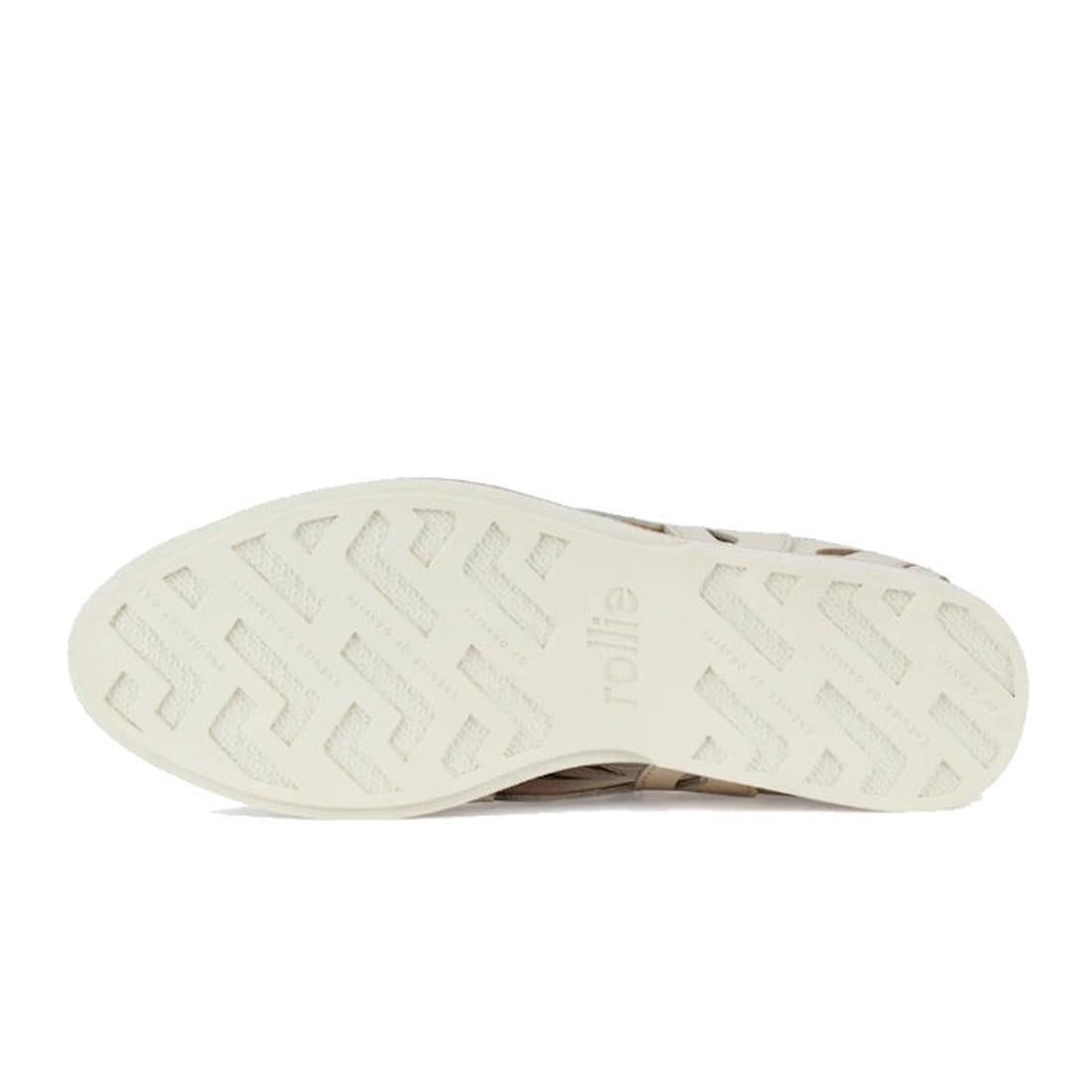 Bottom view of the Rollie Derby Sidecut Applique Bone Womens Leather Shoe, showing a textured sole with a repeating geometric pattern and the brand name in the center.