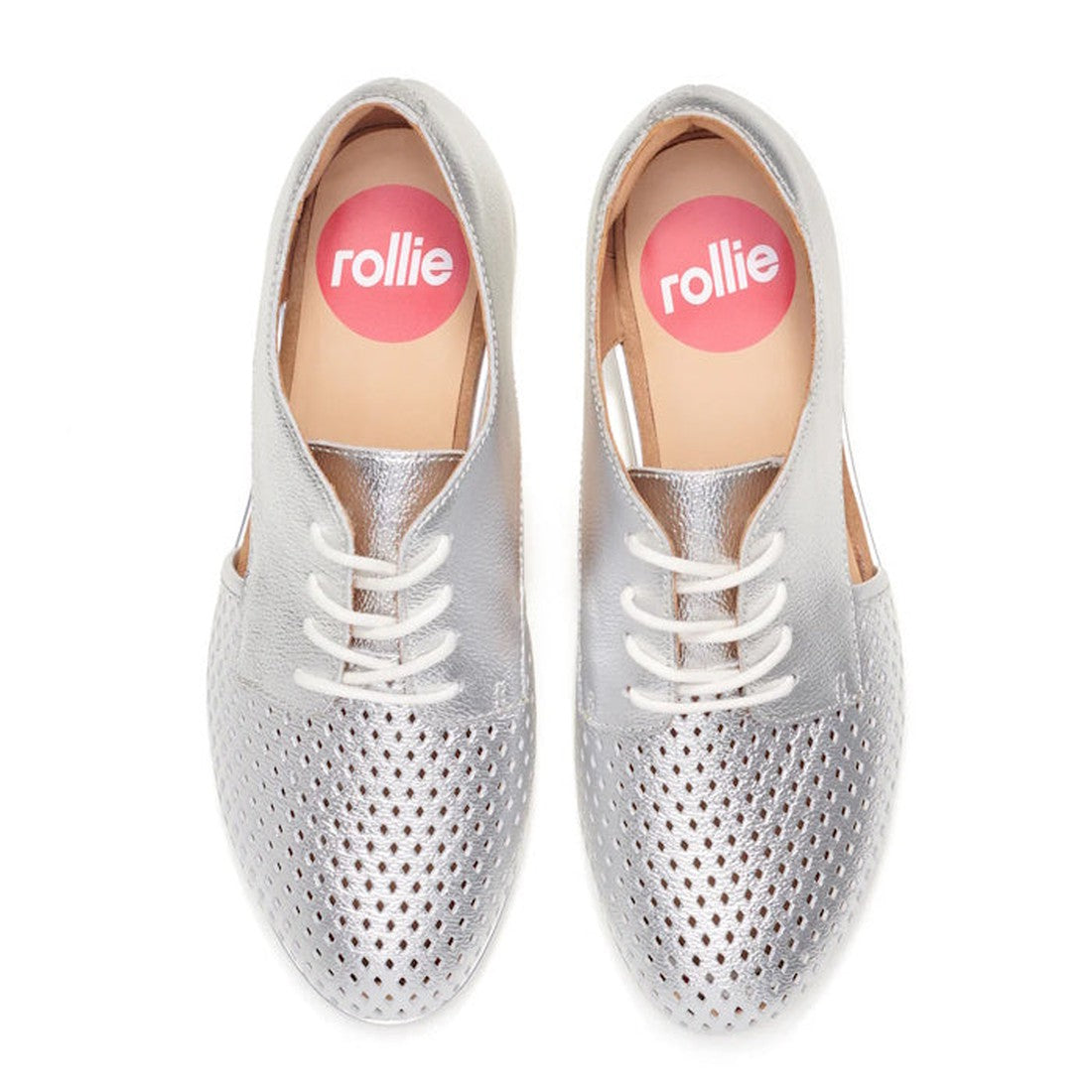 The Rollie Womens Sidecut Punch Silver Metallic Leather Shoe features metallic silver leather, white laces, perforated toe design, tan insoles with "rollie" in a pink circle, and an anti-slip rubber outsole for comfort., 9339554231341, 9339554231358, 9339