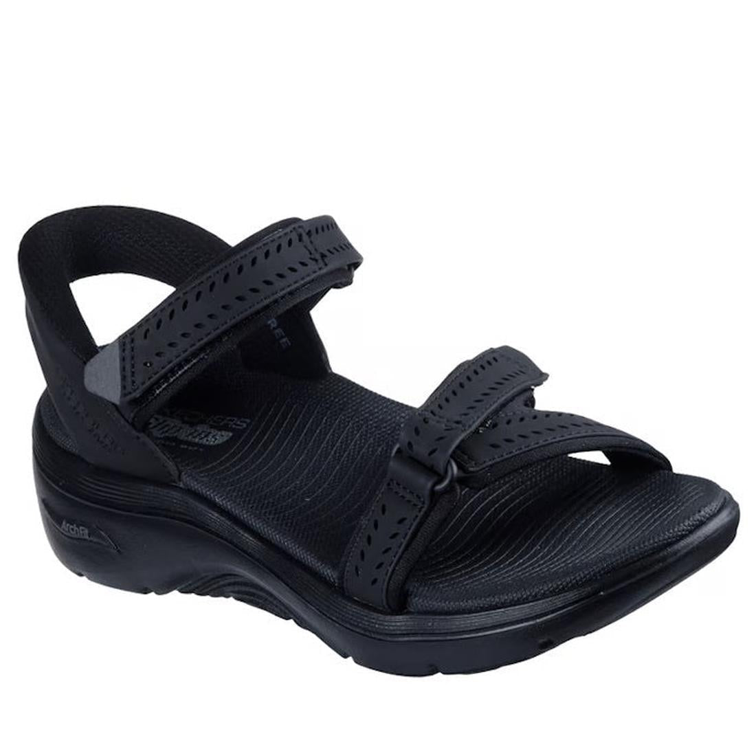 The Skechers Women's Go Walk Arch Fit 2.0 SLIP INS Candace Black Sandal features two adjustable Velcro straps, a contoured sole for comfort and support, a textured footbed, a slightly elevated heel, and is vegan-friendly.