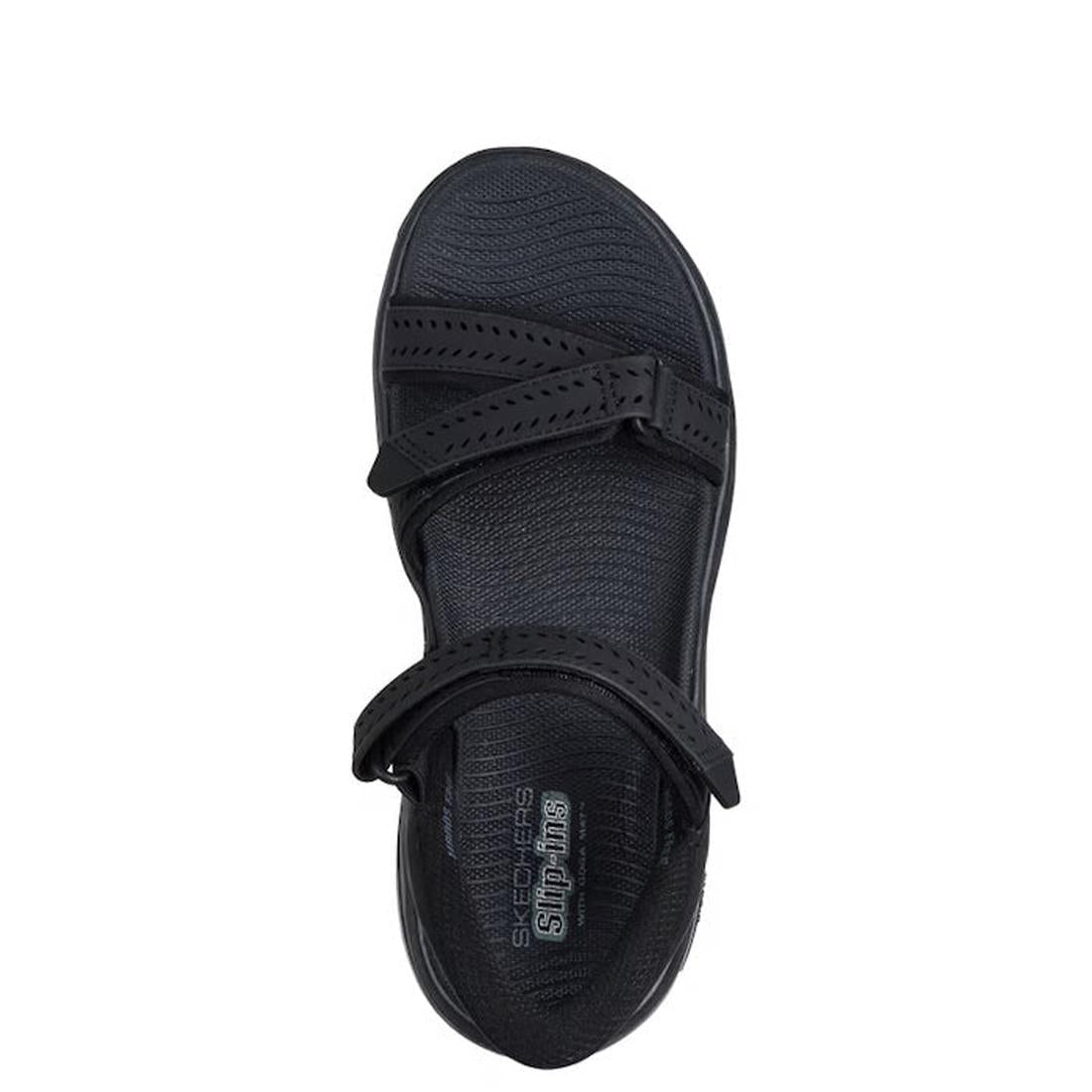 The Skechers Women's Go Walk Arch Fit 2.0 SLIP-INS Candace black sandal features two adjustable straps and a textured footbed, viewed from above on white. This vegan sandal offers comfort and support., 49057, 198739235920, 198739235937, 198739235944, 1987