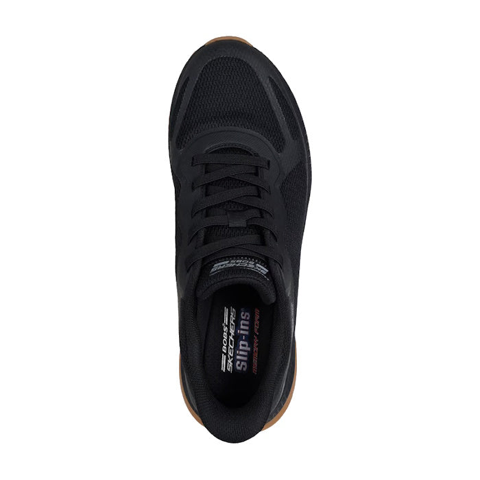 Top view of the Skechers Mens Bobs Sport Squad Chaos 4 Slip In WIDE Width Black sneaker with black laces, mesh toe detailing, brown rubber sole, and Memory Foam insole for comfort. Displayed on a white background.