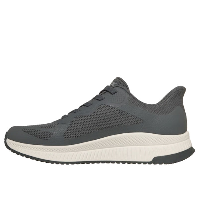 The Skechers Mens Bobs Sport Squad Chaos 4 Slip In in Charcoal Grey is a gray athletic sneaker with a mesh upper, slip-in design, thick white textured sole, and Memory Foam insole for all-day comfort, shown from the side.