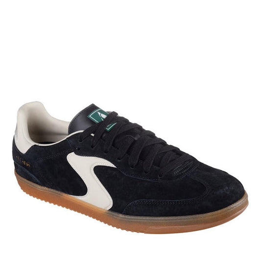 The Skechers Mens Hot Shot Azir Black Neutral Lace Up Sneaker features a black suede court style, black laces, white side stripe, off-white heel, green tongue logo, brown gum sole, and Air-Cooled Memory Foam for all-day comfort.