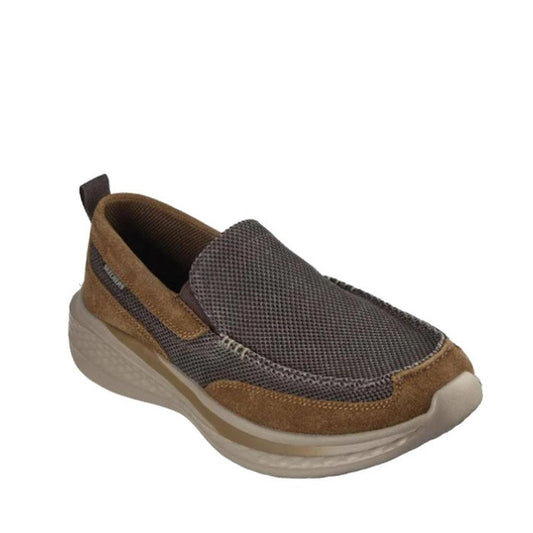 The Skechers Mens Slade Muson Brown Slip on Trainer features a brown suede and gray mesh upper, Relaxed Fit design, light-colored cushioned sole, Air-Cooled Memory Foam comfort, and a heel pull tab for easy wear.