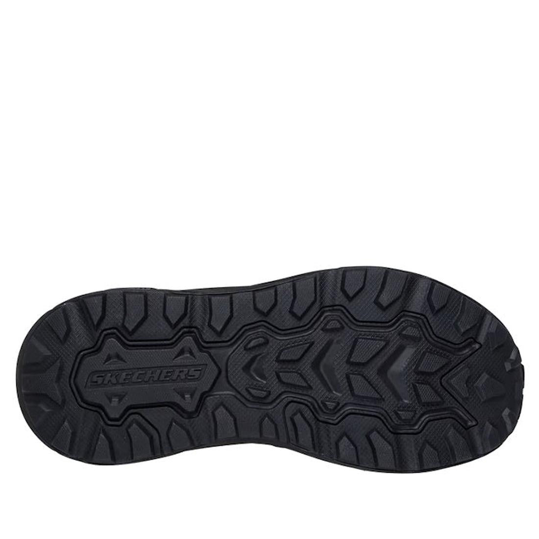 The image displays the black textured sole of Skechers Slip-ins Relaxed Fit: Conner - Rayne Mocc Sneaker, with deep rugged treads and the Skechers logo embossed in the center for reliable grip., 52119, 52120, 198739677461, 198739677485, 198739677508