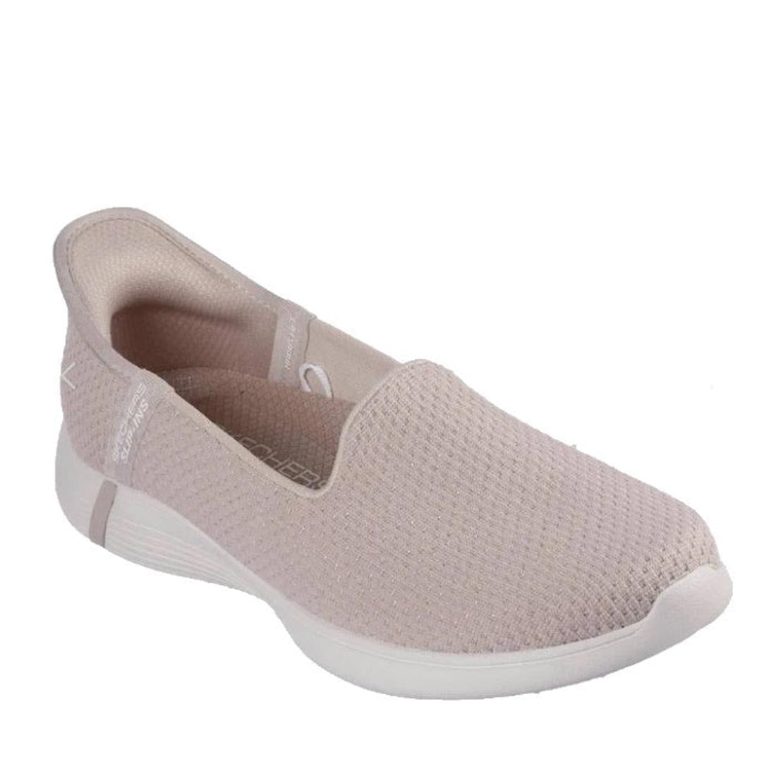 The Skechers Slip-Ins On The Go Swift Luminary Taupe Gold is a light beige, slip-on sneaker with a sparkling knit upper, white cushioned sole, rounded toe, Air-Cooled Memory Foam comfort, and a flexible design for casual wear.