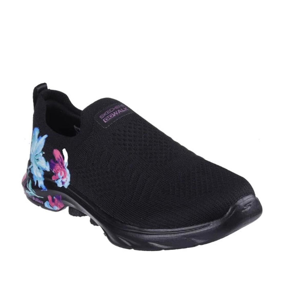 The Skechers Go Walk 7 Black Multi Floral women's slip-on features a stretch-fit mesh upper, blue and pink floral accents on the heel and sole, and Air-Cooled Memory Foam for all-day comfort.