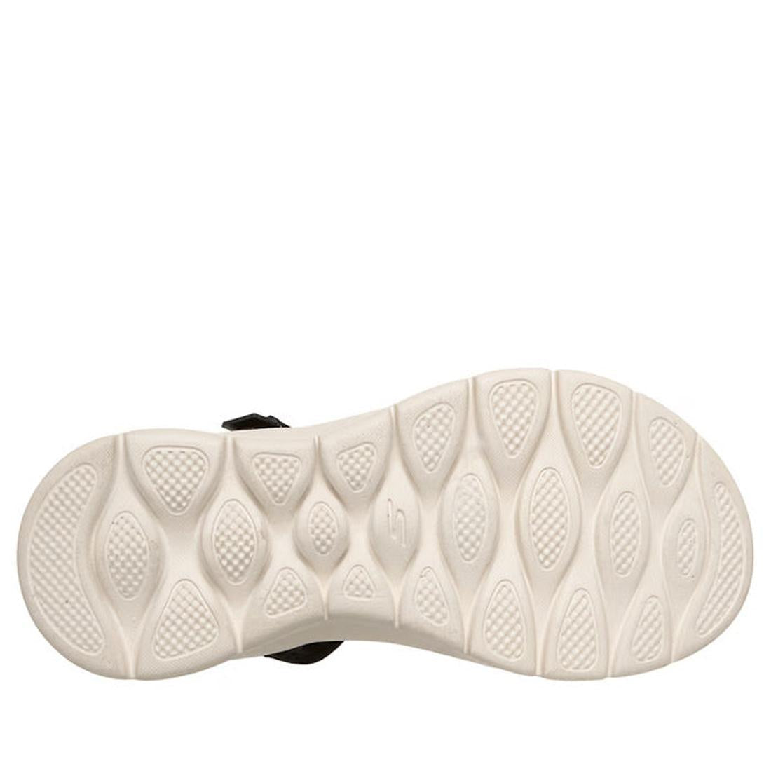 The image shows the underside of a Skechers Womens Slip Ins Sandals Go Walk Flex Sssophia Black sole, featuring oval and diamond-shaped textured grips on a plain white background, which highlights the sporty sandal's design., 198376904128, 198376904135, 1