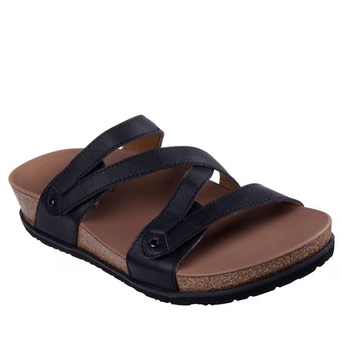 The Skechers Womens Arch Fit Granola Slim Black Slide features a leather upper, three straps, cork footbed, black rubber outsole, slight wedge heel, and comfort inspired by Skechers Arch Fit support in a casual design.