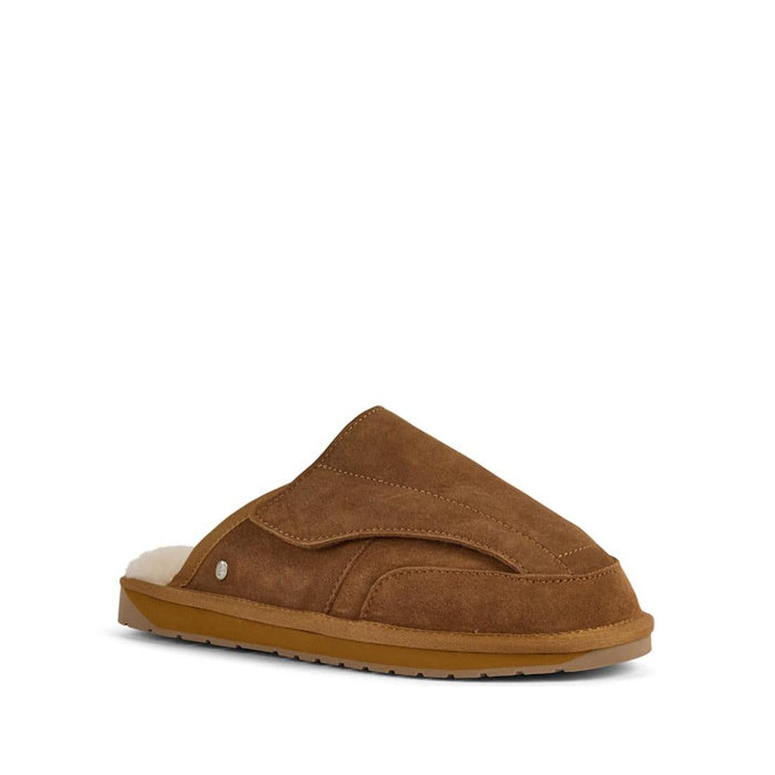 The EMU FlexiCare Wide Opening Sheepskin Scuff Chestnut Slipper is a brown unisex slip-on with a rubber sole and white fleece lining, displayed at an angle on a plain white background.