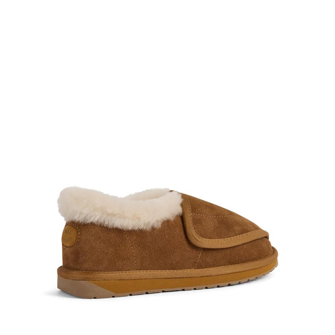 The EMU FlexiCare Wide Opening WIDE Width Sheepskin Slippers in Chestnut feature brown suede, a tan rubber sole, plush white lining, closed toe, low back, and an adjustable Velcro top flap for comfort and easy fit., 9330071991237, 9330071991244, 933007199