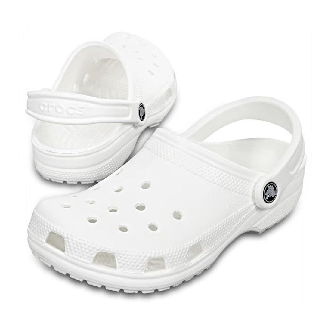 A pair of Crocs - Classic Clog White Adults Womens & Mens with ventilation holes and adjustable heel straps, shown against a plain white background.